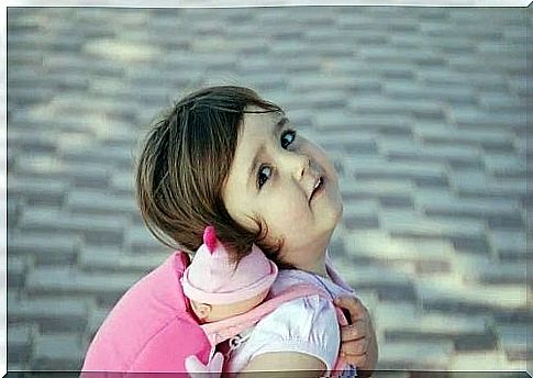 Little girl practicing exercises to teach the child to walk