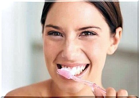 Woman using natural teeth whitening products