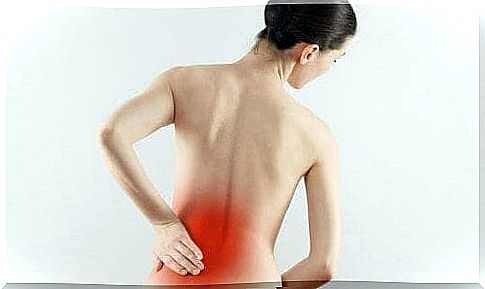 Woman experiencing low back pain