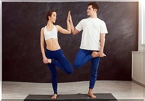 Couple practicing yoga together