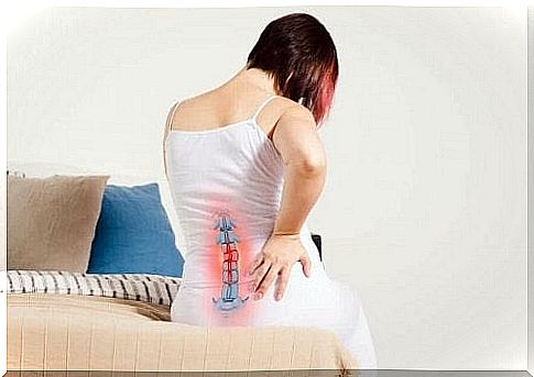 Woman experiencing back pain