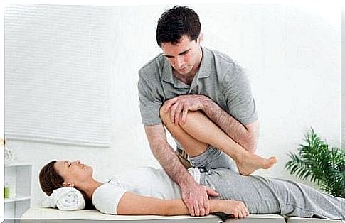 Physiotherapist treating a patient