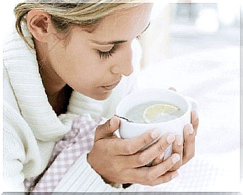 Girl drinking tea for the flu